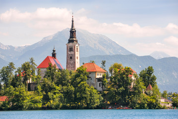 Island with Catholic Church on Bled Lake in Slovenia with Mounta