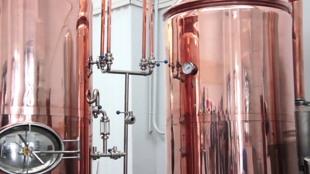 Copper tuns for brewing at a brewery