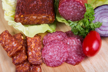 Sausage of salami on a cutting board