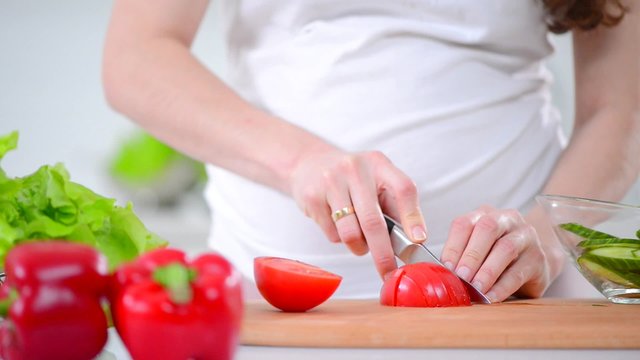 Healthy eating for pregnant woman. Cooking fresh vegetables salad