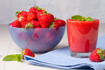 Ripe strawberries and strawberry smoothie