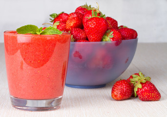 Ripe strawberries and strawberry smoothie