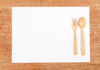 paper and wooden spoon - menu concept