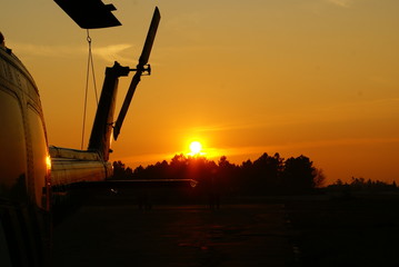 Helicopter at the sunset