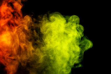 Abstract red and yellow smoke hookah on a black background.