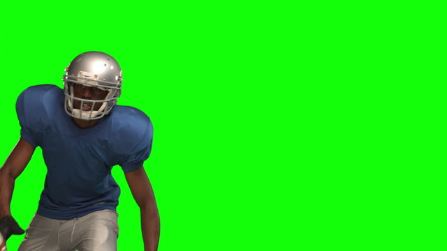 American football player catching ball 