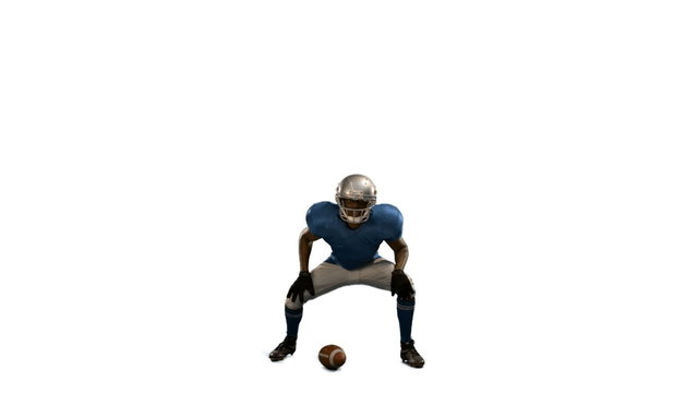 American football player in attack stance 