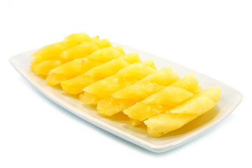 Pineapple slices in a white background.