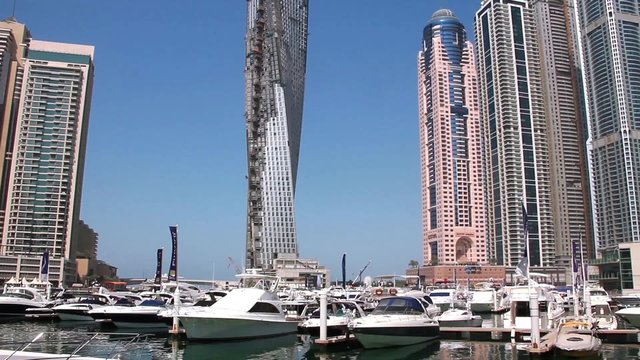 Infinity tower and skyscrapers of Dubai Marina in United Arab Emirates