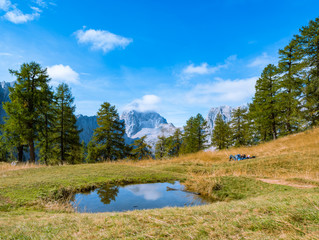 Beautiful mountain panorama in Julian Alps in Slovenia. This is a typical postcard from Slemenova spica with the mighty Jalovec in the backround.