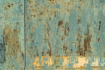 Fototapeta premium iron surface is covered with old paint texture background