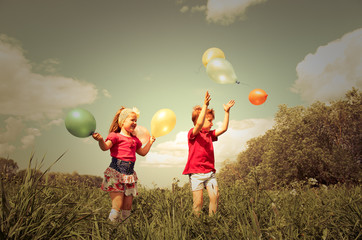 children with balloon outdoor