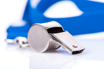 Metal whistle with blue lanyard