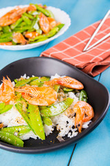 prawn and snow peas on topped of the rice