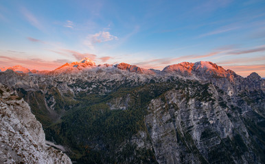 Sunrise in the mountains. Early morning as viewed from the top of Visevnik hill with vast landscape below.