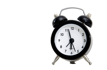 Classic alarm clock isolated on white background.