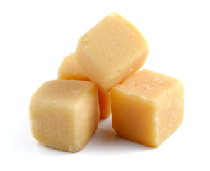 Brown cube sugar on white background.