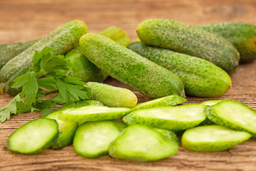 Fresh pickle cucumbers on wooden table