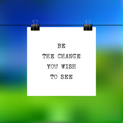 Inspirational Poster with the text. Be the change you wish to see. Typographic work on a blurred background