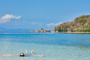 Fototapeta na wymiar tourist sunbathing swimming Palawan Philippines