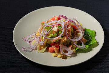 portion served in a restaurant decorated with lettuce