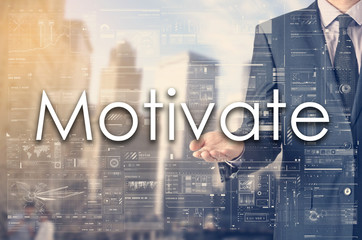 Businessman showing text by his hand: Motivate