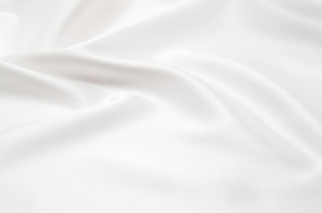 Fototapeta na wymiar white satin fabric as background