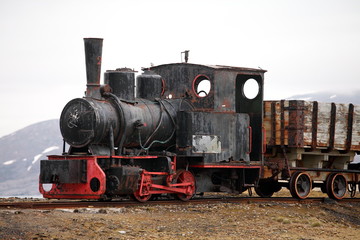 Fototapeta na wymiar Old industrial train in Ny Alesund, Spitzbergen 