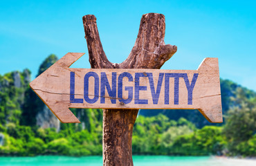 Longevity arrow with beach background
