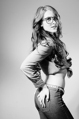 Image of young trendy pretty lady wearing hipster glasses, black