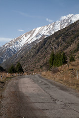 Fototapeta na wymiar The road into the mountains. Kyrgyzstan. Ala-Archa.