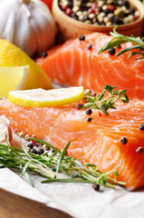 Raw salmon on baking paper
