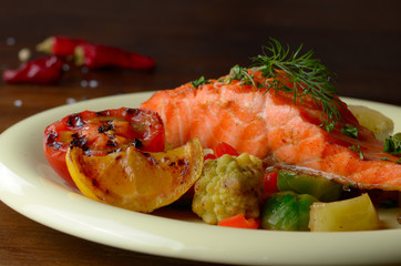 Fried salmon fillet with vegetables