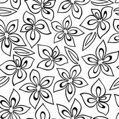 Seamless floral pattern with black abstract flowers painted on a white background