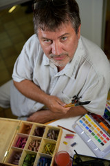 Portrait of a painter in his workshop