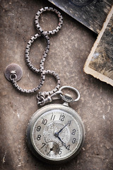 old watch on the grungde post card and photo