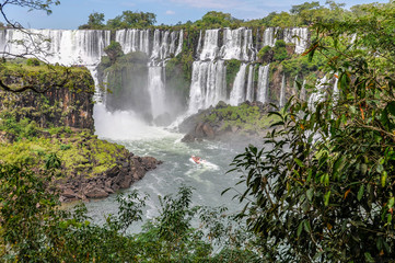 Fototapeta premium Boats around Iguazu Falls, Argentina