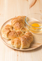 croissant  on wooden plate