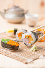 sushi on wooden background