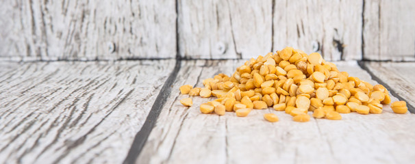 Raw Indian dhal over wooden background