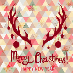 Christmas card with triangle background and abstract antlers