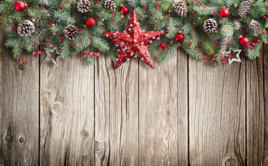 Christmas Fir Tree Decorated On Wooden Background
