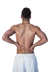 Fototapeta premium Rear view of man suffering from back pain
