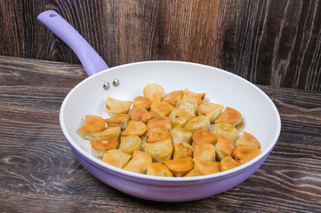 Fried dumplings in the pan
