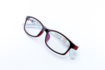 Black glasses to improve eyesight isolated on white background