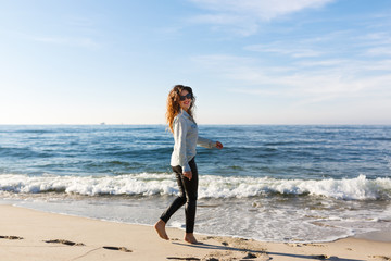 Happy woman at the sea