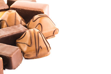 Delicious chocolate candy isolated on white background, with copy space