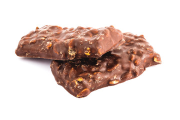 Two sweet chocolate cookies with nuts, isolated on white background