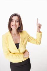 young business woman showing something on the white background