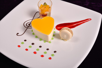 colourful dessert at the restaurant, mix fruits cake and macaron